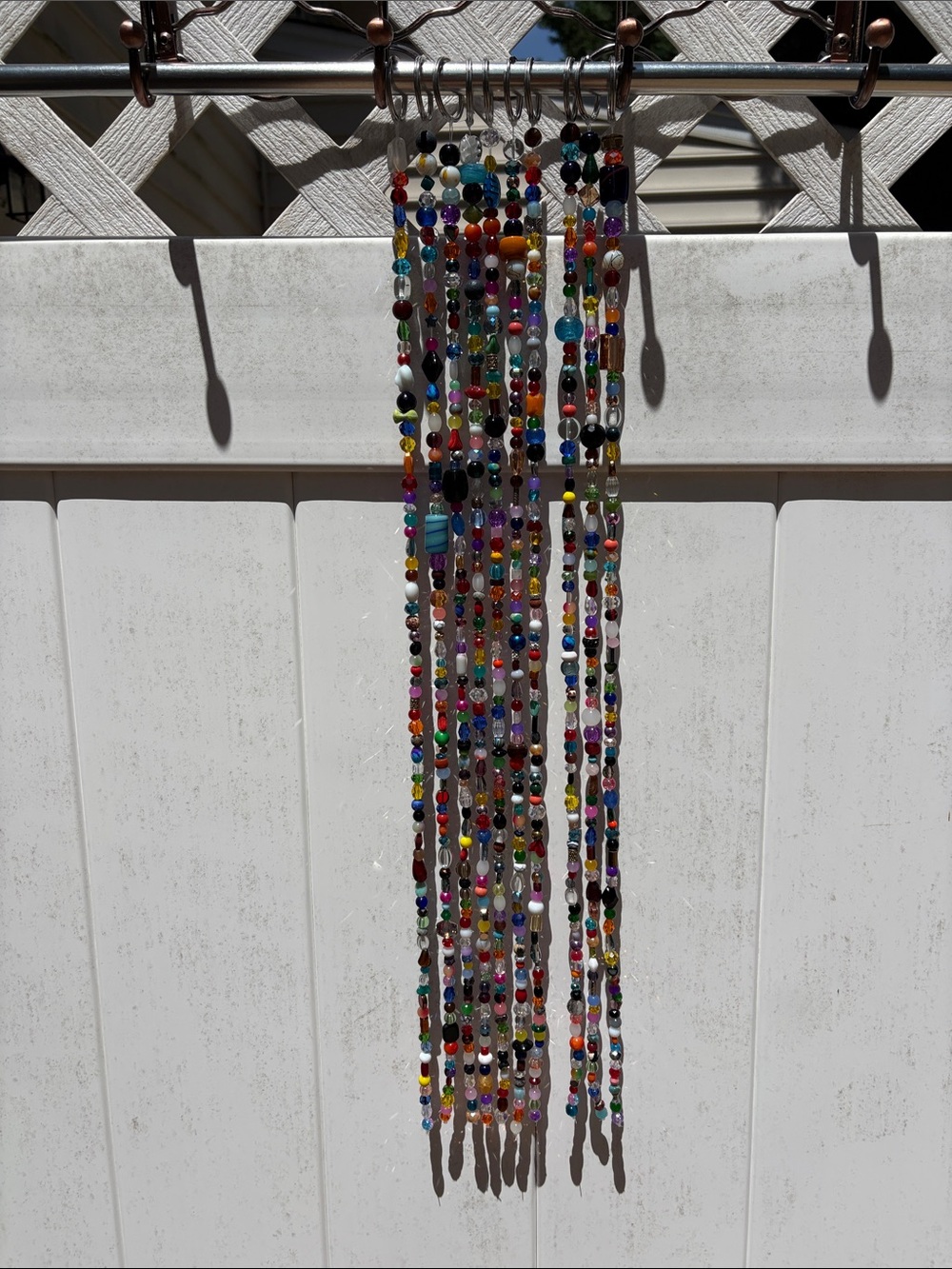 10 strands 26 inches long made with glass & crystal beads